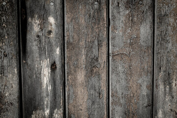 Naklejka premium wooden background with weathered wood and ruusty nails