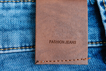 Blue Denim Jeans,belt,jeans pants with leather belt.label,sticker,tab,tag on the jeans.Empty blank...