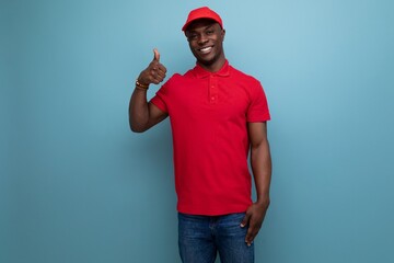 handsome courier american man dressed in red cap and t-shirt with dal print logo mockup