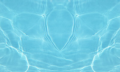 Blue water with ripples on the surface. Defocus blurred transparent blue colored clear calm water surface texture with splashes and bubbles. Water waves with shining pattern texture background.