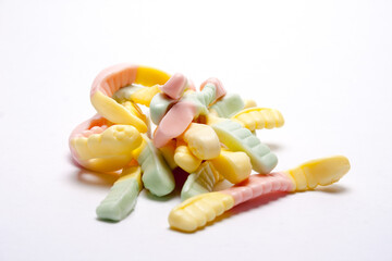 colorful jelly candies in the shape of a worm