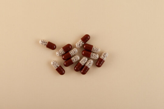 Pancreatin pills. Pancreatic enzymes. Capsules filled with gastro-resistant granules