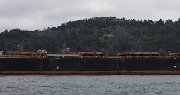 Cargo ship with tankers transports cargo by sea. Maritime logistics and delivery of goods