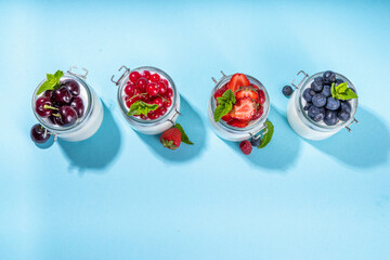 Fototapeta na wymiar Set yogurts with summer berry
