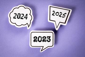 2023, 2024 and 2025 Concept. Speech bubbles with text on purple background