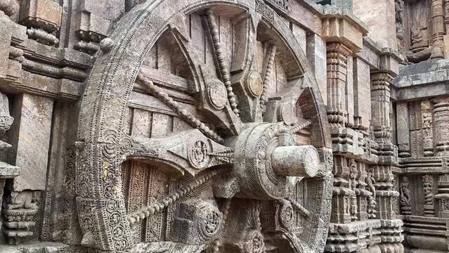 Carvings on stone wheel in ancient Surya Hindu Temple Konark, Odisha, India