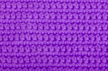 purple knitted wool textured background