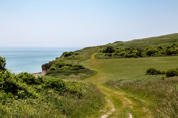 Looking along the path on the cliffs above the beach, leading from Eastbourne towards Beachy Head in Sussex