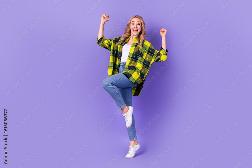 Sticker Full length photo of charming lucky woman dressed checkered jacket screaming rising fists isolated purple color background