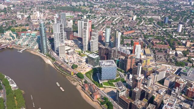 Aerial view of Embassy Gardens, Nine Elms, Vauxhall Bridge and the River Thames. Views to Westminster. London UK.