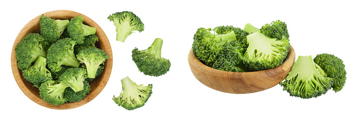 fresh broccoli in wooden bowl isolated on white background close-up with full depth of field. Top view. Flat lay