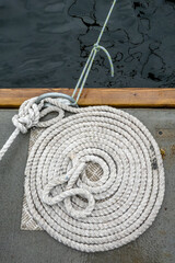Stockholm, Sweden  A coiled ship rope or line in a marina.