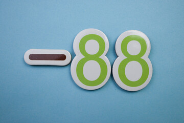 The number -88 written in color on a blue background.
