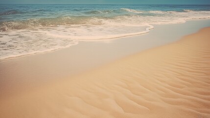 Fototapeta na wymiar Waves on a beach with clear skies