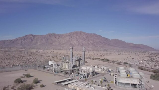 View from a drone flying to a termoelectric plant in the desert of Mexicali, Baja California, Mexico