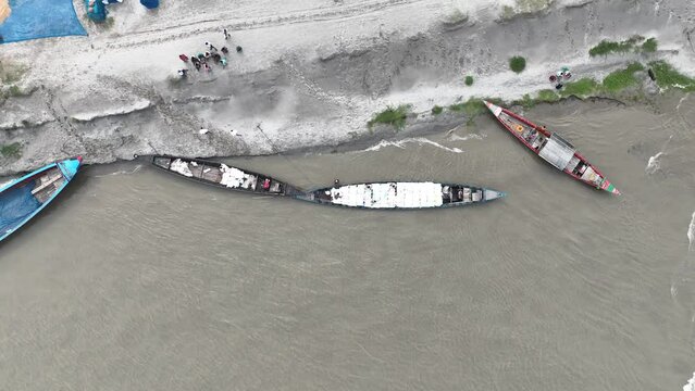 Aerial view of the boat with many bags on it