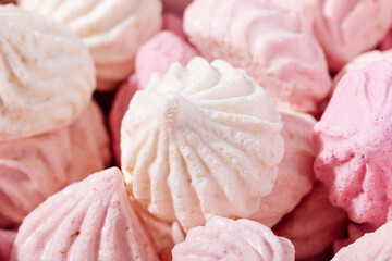 Pink meringue cookies with berry flavor