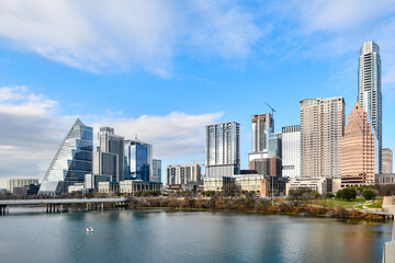Fototapeta na wymiar Numerous condos and highrises form Austin's downtown city skyline along the Colorado River