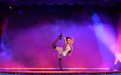 Clown woman in a elegant theater stage ready to the performance