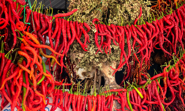 bunch of red hot peppers and spices