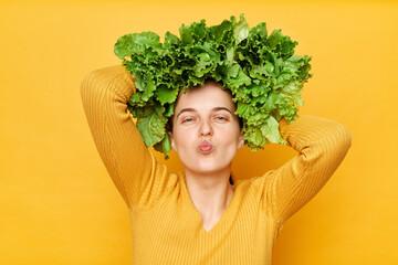 Green food lifestyle. Slimming weight loss. Care for wellness. Romantic woman with lettuce hair...