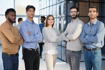 Fototapeta premium Multiracial business team standing in the office