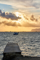 sunset on the Stagnone di Marsale with favignana island in the background