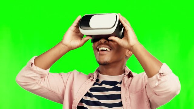 Black man, cyber and vr metaverse on green screen in studio isolated on a background. Virtual reality, ui and happy African person with futuristic digital technology for 3d fantasy video on internet.