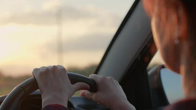 hands steering wheel. girl driving car adventure. young woman road journey vacation car. transport job automotive sitting. highway turn steering. automotive travels wheel trip. summer car, transport