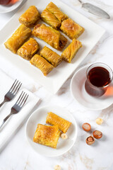Pistachio baklava. Close-up baklava isolated on white background. Mediterranean cuisine delicacies
