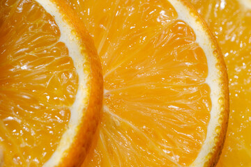 sliced juicy slices of ripe orange close-up