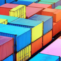 Fototapeta premium The colorful containers are neatly arranged for shipping by ship.generative AI