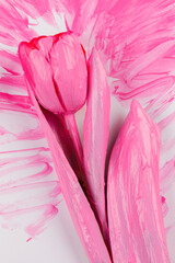 Pink tulip on a watercolor background. The concept of flower creativity.
