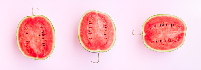 Watermelon fruit sliced half on pink background, Organic fruit, Summer concept