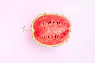 Watermelon fruit sliced half on pink background, Organic fruit, Summer concept