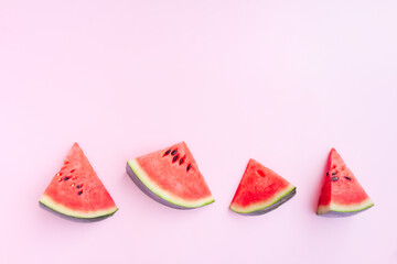 Watermelon fruit sliced on pink background, Organic fruit, Summer concept