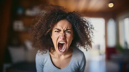 Fotobehang angry or loud scream, screaming adult woman, in rage © wetzkaz