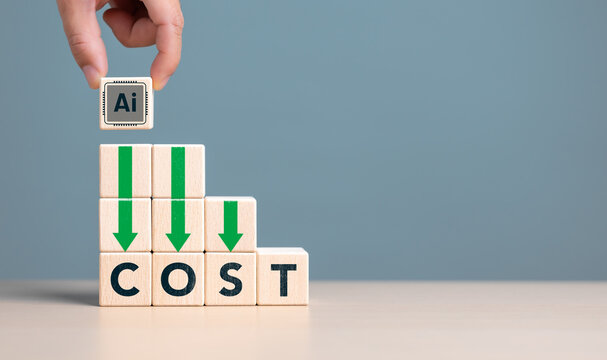 Lean or Cost reduction by Machine learning. AI or Artifice intelligence to optimize manufacturing. Decreasing expense to maximize profits. Hand put wooden cube with AI icon and cost down green arrows.