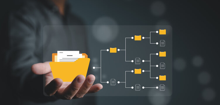 Document Management System or DMS, Cloud document database, Businessman hand show folder and document icons on virtual screen. Setup for storage backup online application. Software for managing files.