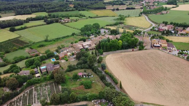 4K Drone Footage. Pubol. Old Village Of Girona. Colorful fields. Catalonia. Spain. 12 june 2023