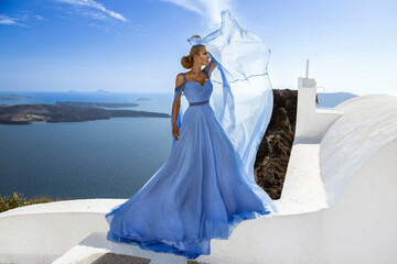 Elegant luxury evening fashion. Glamour, stylish elegant woman in long gown dress is posing outdoor...