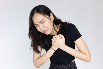 Asian woman suffering sudden heart attack, cardiac arrest