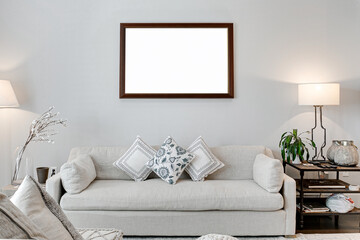 Clean Minimal Modern Living Room Interior with Elegant Styled Home Decor and Linen Couch and Blank Photo Frame Mockup