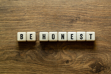 Be honest - word concept on building blocks, text