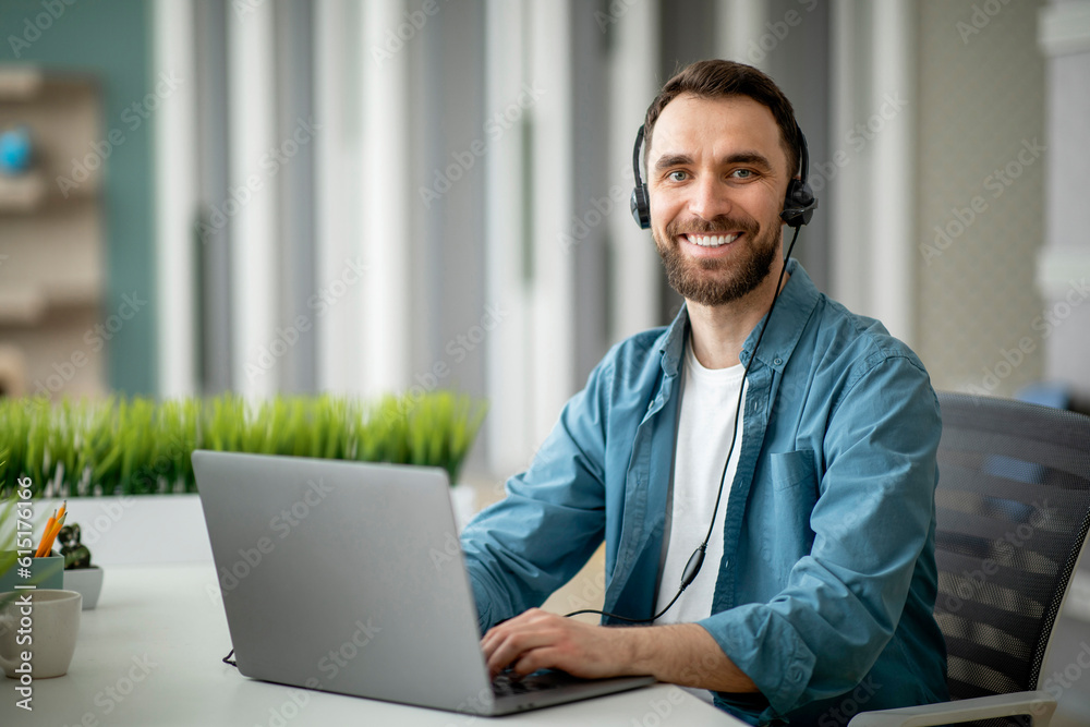 Aufkleber hotline operator. handsome customer support manager man at workplace in office