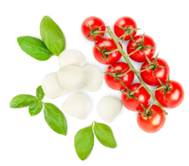 Foto op Plexiglas cherry tomatoes, mozzarella and basil leaves on a white isolated background, top view © Ирина Гутыряк