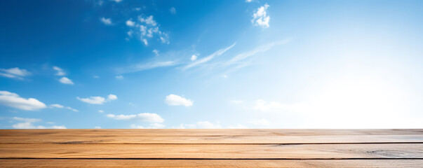 wooden table and blue sky, Simplicity in Serenity: Close-Up of an Empty Wooden Table, Bathed in Sunlight Against a Dreamy Unsharp Blue Sky Backdrop