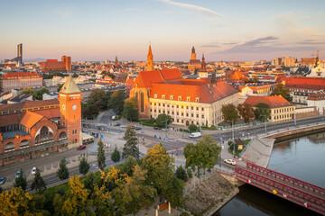 Fototapeta na wymiar Wrocław - Market Hall & University at sunrise