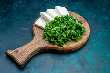 front view white cheese with fresh greens on dark-blue background greens cheese food breakfast vegetable - obrazy, fototapety, plakaty