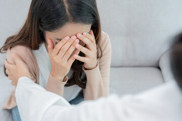 psychiatrist holds shoulders while discussing life and family issues. doctor encourages and empathy woman suffers depression. psychological, save divorce, Hand in hand together, trust, care